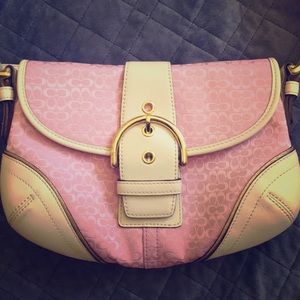 small pink coach handbag with gold hardware